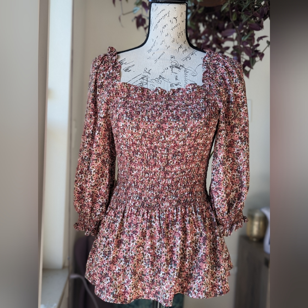 Floral patterned peplum top